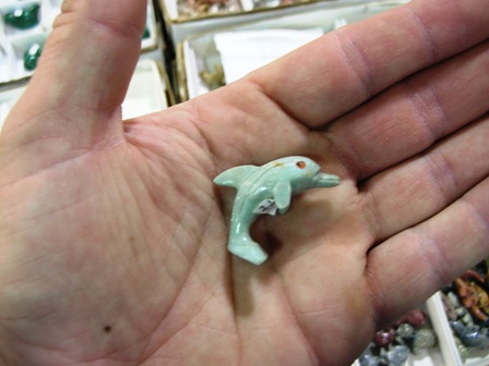 A soapstone dolphin figurine